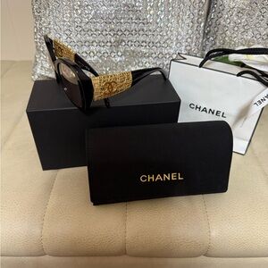 Chanel Black and Gold Sunglasses with Iconic Design